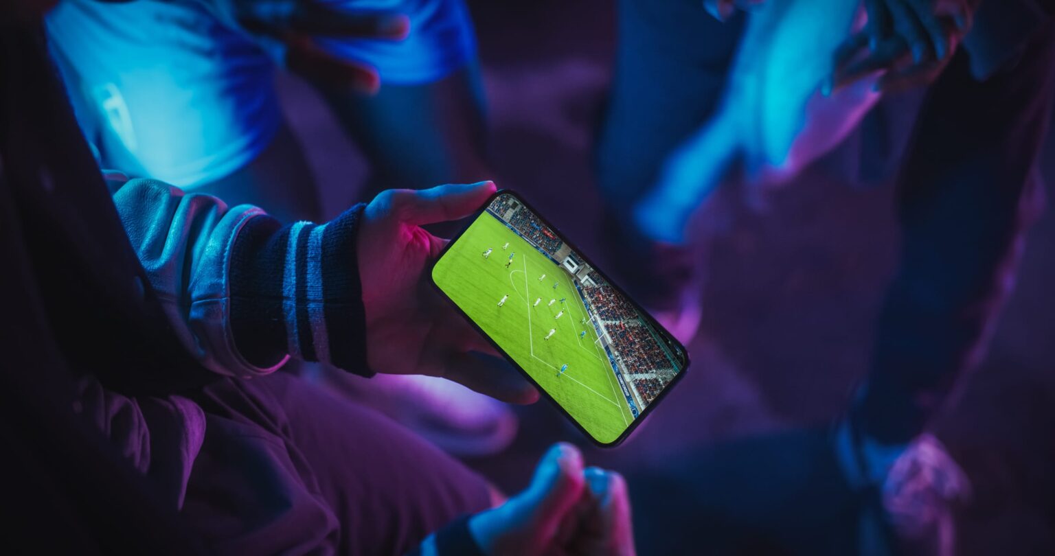Players engaging with a mobile football game