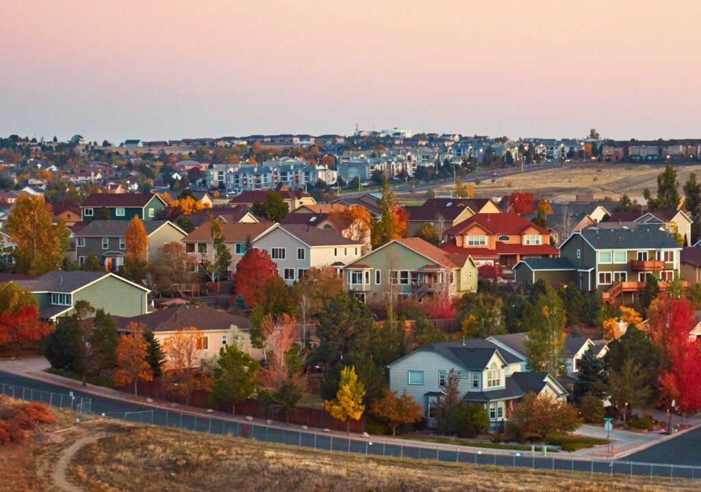 Arial view of town houses with colorful fall tones