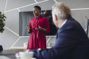 Female finance worker makes presentation to the board