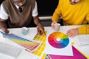Two designers working on the color palette for a b2b brand