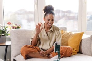 Woman self recording a video interview
