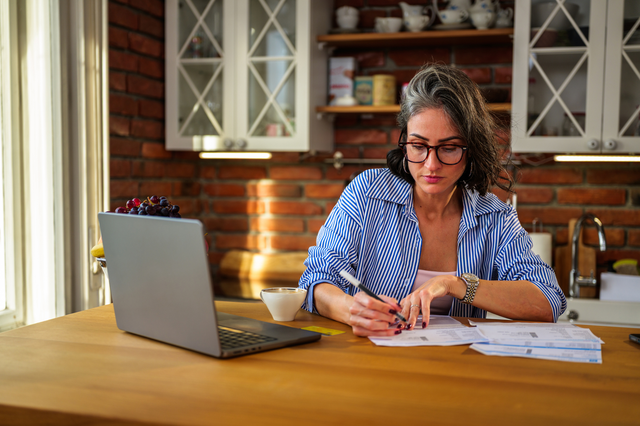 Person managing their finances on a phone